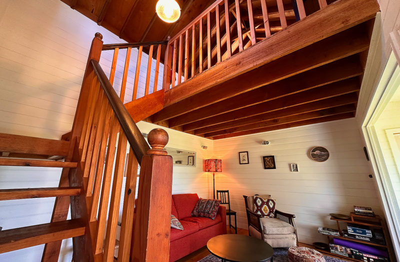 Cottage staircase and loungeroom